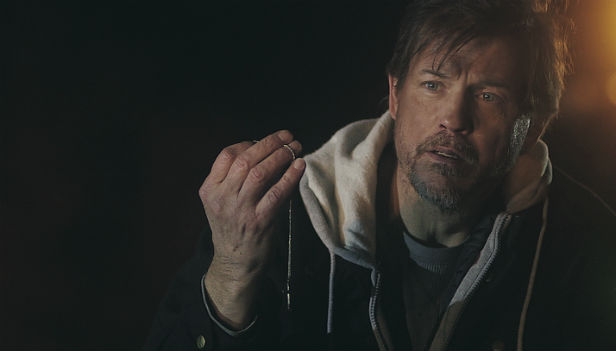 Michael Pare as Thomas in The Shelter