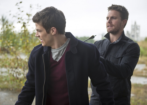 The Flash -- "Flash vs. Arrow" -- Image FLA108b_0147b -- Pictured (L-R): Grant Gustin as Barry Allen and Stephen Amell as Oliver Queen -- Photo: Diyah Pera/The CW -- ÃÂ© 2014 The CW Network, LLC. All rights reserved.